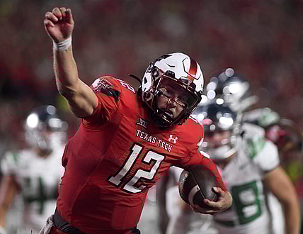 Texas Tech's quarterback Tyler Shough (12) scores a touchdown against Oregon in a non-conference football game, Saturday, Sept. 9, 2023, at Jones AT&T Stadium.