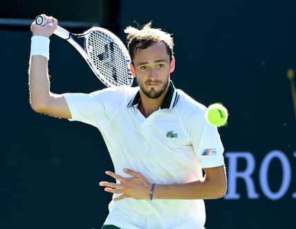 Oct 13, 2021; Indian Wells, CA, USA; Daniil Medvedev (RUS) hits a shot against Grigor Dimitrov (BUL) in his fourth round match during the BNP Paribas Open at the Indian Wells Tennis Garden. Mandatory Credit: Jayne Kamin-Oncea-USA TODAY Sports