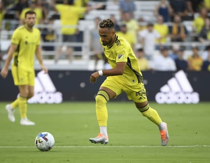 Aug 6, 2022; Nashville, Tennessee, USA;  Nashville SC midfielder Hany Mukhtar (10) dribbles against the Toronto FC during the first half at Geodis Park. Mandatory Credit: Steve Roberts-USA TODAY Sports