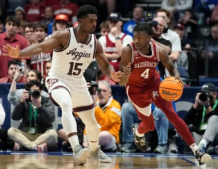 Arkansas guard Davonte Davis (4) dribbles past Texas A&M forward Henry Coleman III (15) during the second half of a quarterfinal SEC Men   s Basketball Tournament game at Bridgestone Arena Friday, March 10, 2023, in Nashville, Tenn.

Sec Basketball Arkansas Vs Texas A M