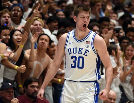 Nov 10, 2023; Durham, North Carolina, USA;  Duke Blue Devils center Kyle Filipowski(30) reacts to scoring during the second half against the Arizona Wildcats at Cameron Indoor Stadium. Mandatory Credit: Rob Kinnan-USA TODAY Sports