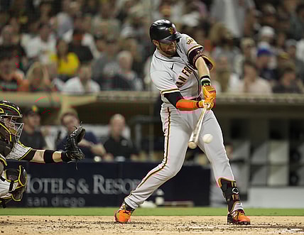 Sep 22, 2021; San Diego, California, USA; San Francisco Giants third baseman Evan Longoria (10) singles against the San Diego Padres during the fourth inning at Petco Park. Mandatory Credit: Ray Acevedo-USA TODAY Sports