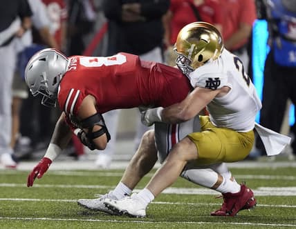 Sep 3, 2022; Columbus, Ohio, USA; Ohio State Buckeyes tight end Cade Stover (8) gets tackled by Notre Dame Fighting Irish linebacker JD Bertrand (27) after a catch in the second quarter of the NCAA football game between Ohio State Buckeyes and Notre Dame Fighting Irish at Ohio Stadium. Mandatory Credit: Kyle Robertson-USA TODAY Sports