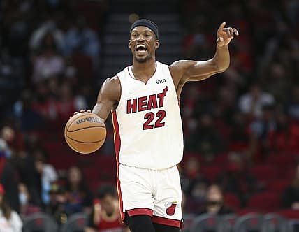 Dec 31, 2021; Houston, Texas, USA; Miami Heat forward Jimmy Butler (22) brings the ball up the court during the third quarter against the Houston Rockets at Toyota Center. Mandatory Credit: Troy Taormina-USA TODAY Sports