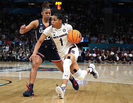 Apr 3, 2022; Minneapolis, MN, USA; South Carolina Gamecocks guard Zia Cooke (1) drives to the basket against UConn Huskies guard Evina Westbrook (22) during the first half in the Final Four championship game of the women's college basketball NCAA Tournament at Target Center. Mandatory Credit: Kirby Lee-USA TODAY Sports