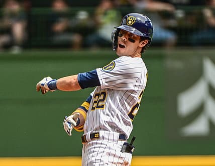 Aug 28, 2022; Milwaukee, Wisconsin, USA; Milwaukee Brewers left fielder Christian Yelich (22) reacts after he was thrown out trying to stretch a single into a double in the first inning against the Chicago Cubs at American Family Field. Mandatory Credit: Benny Sieu-USA TODAY Sports