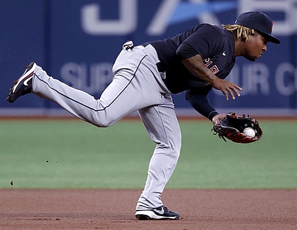 Jul 5, 2021; St. Petersburg, Florida, USA;  Cleveland Indians third baseman Jose Ramirez (11) throws the ball for an out during the first inning against the Tampa Bay Rays at Tropicana Field. Mandatory Credit: Kim Klement-USA TODAY Sports