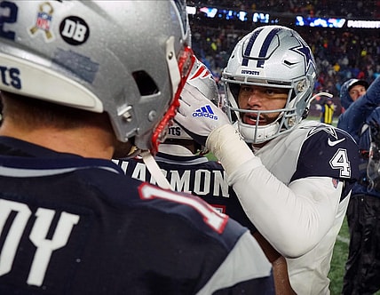 Nov 24, 2019; Foxborough, MA, USA; Dallas Cowboys quarterback Dak Prescott (4) greets New England Patriots quarterback Tom Brady (12) after the game at Gillette Stadium. Patriots defeated the Cowboys 13-9. Mandatory Credit: David Butler II-USA TODAY Sports