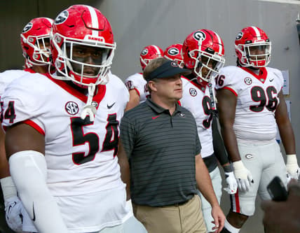 Georgia Bulldogs head coach Kirby Smart walks out of the tunnel with his team at the start of the annual Florida Georgia rivalry game at TIAA Bank Field in Jacksonville Fla. October 30, 2021.

Flagi 103021 Florida Georgia Fb 37