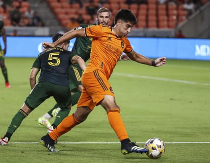 Sep 3, 2021; Houston, Texas, USA; Houston Dynamo FC forward Mateo Bajamich (7) controls the ball against the Portland Timbers during the second half at BBVA Stadium. Mandatory Credit: Troy Taormina-USA TODAY Sports