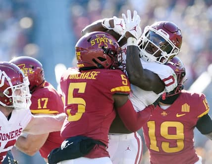 Oct 29, 2022; Ames, Iowa, USA;  Iowa State Cyclones defensive back Myles Purchase (5) knocks the ball out from Oklahoma Sooners running back Eric Gray (0) during the first quarter in the Big 12 Conference game  at Jack Trice Stadium. Mandatory Credit: Nirmalendu Majumdar/Ames Tribune-USA TODAY Sports