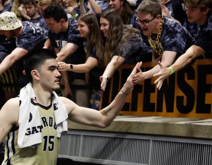 Purdue Boilermakers center Zach Edey (15) high fives fans after the NCAA men   s basketball game, Sunday, March 5, 2023, at Mackey Arena in West Lafayette, Ind. The Purdue Boilermakers won 76-71.

Purillini030523 Am8898