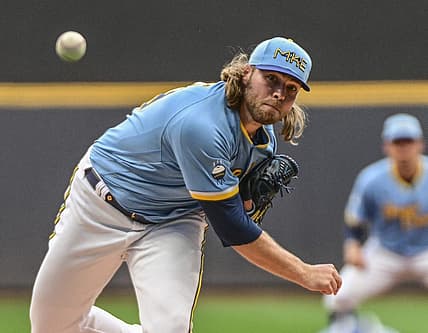 Jul 22, 2022; Milwaukee, Wisconsin, USA;  Milwaukee Brewers pitcher Corbin Burnes (39) throws a pitch in the first inning against the Colorado Rockies at American Family Field. Mandatory Credit: Benny Sieu-USA TODAY Sports