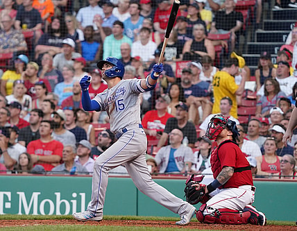 Jun 28, 2021; Boston, Massachusetts, USA; Kansas City Royals right fielder Whit Merrifield (15) hits a home run against the Boston Red Sox during the second inning at Fenway Park. Mandatory Credit: David Butler II-USA TODAY Sports