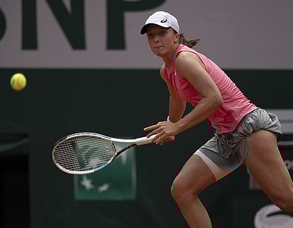 Jun 9, 2021; Paris, France; Iga Swiatek (POL) in action during her match against Maria Sakkari (GRE) on day 11 of the French Open at Stade Roland Garros. Mandatory Credit: Susan Mullane-USA TODAY Sports