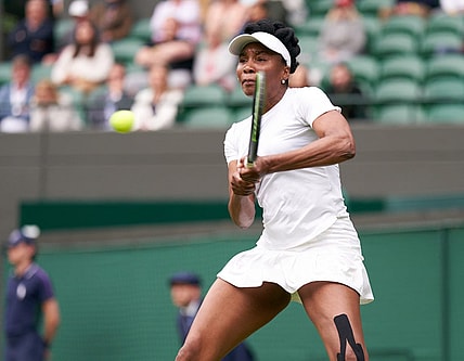 Jun 30, 2021; London, United Kingdom; Venus Williams (USA) seen playing Ons Jabeur (TUN) in second round  singles on No. 1 court at All England Lawn Tennis and Croquet Club. Mandatory Credit: Peter van den Berg-USA TODAY Sports