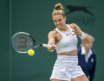 Jun 28, 2022; London, United Kingdom; Maria Sakkari (GRE) returns a shot during her first round match against Zoe Hives (AUS) on day two at All England Lawn Tennis and Croquet Club. Mandatory Credit: Susan Mullane-USA TODAY Sports