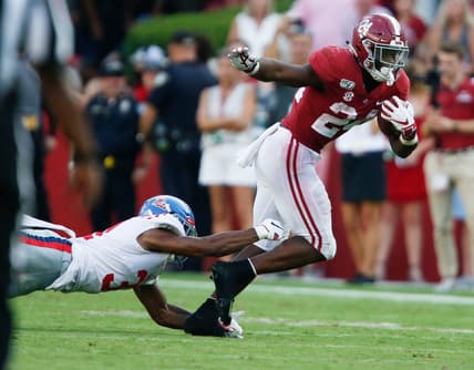 Ole Miss defensive back Jaylon Jones (31) dives to try to make a tackle on Alabama running back Brian Robinson Jr. (24) during the second half of Alabama's 59-31 victory over Ole Miss Saturday, Sept. 28, 2019. [Staff Photo/Gary Cosby Jr.]

Alabama Vs Ole Miss