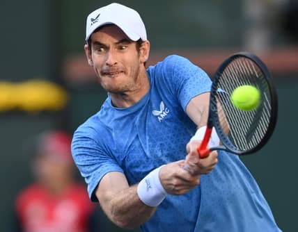 Oct 12, 2021; Indian Wells, CA, USA; Andy Murray (GBR) hits a shot against Alexander Zverev (GER) during a third round match in the BNP Paribas Open at the Indian Wells Tennis Garden. Mandatory Credit: Jayne Kamin-Oncea-USA TODAY Sports