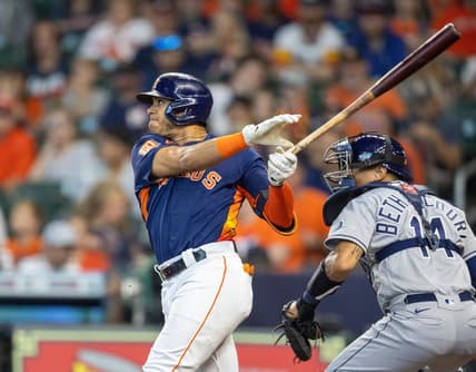 Oct 2, 2022; Houston, Texas, USA;  Houston Astros shortstop Jeremy Pena (3) hits a two run home run against the Tampa Bay Rays in the first inning at Minute Maid Park. Mandatory Credit: Thomas Shea-USA TODAY Sports