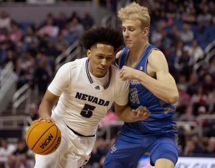 Nevada forward Darrion Williams (5) drives past Air Force forward Rytis Petraitis (31) during the first half of a basketball game played at Lawlor Events Center in Reno, Nev., Friday, Feb. 3, 2023.

Air Force At Nevada Basketball 01