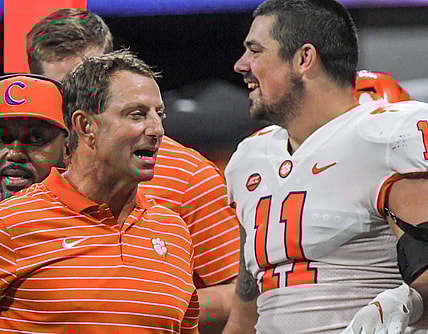 Clemson head coach Dabo Swinney reacts near defensive lineman Bryan Bresee (11) after the game at the Mercedes-Benz Stadium in Atlanta, Georgia Monday, September 5, 2022. Clemson won 41-10.

Ncaa Fb Clemson At Georgia Tech