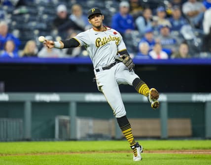 May 31, 2021; Kansas City, Missouri, USA; Pittsburgh Pirates third baseman Erik Gonzalez (2) throws to first base against the Kansas City Royals during the fifth inning at Kauffman Stadium. Mandatory Credit: Jay Biggerstaff-USA TODAY Sports