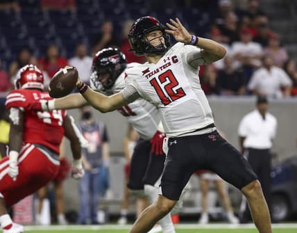 Sep 4, 2021; Houston, Texas, USA; Texas Tech Red Raiders quarterback Tyler Shough (12) attempts a pass during the fourth quarter against the Houston Cougars at NRG Stadium. Mandatory Credit: Troy Taormina-USA TODAY Sports
