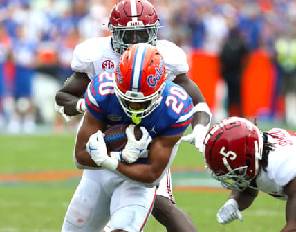 Florida Gators running back Malik Davis (20) runs the ball during the football game between the Florida Gators and The Alabama Crimson Tide, at Ben Hill Griffin Stadium in Gainesville, Fla. Sept. 18, 2021.

Flgai 09182021 Ufvs Bama 36