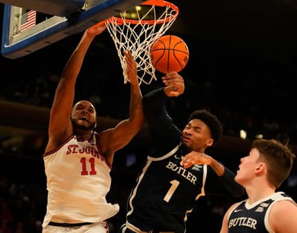 Mar 8, 2023; New York, NY, USA;  Butler Bulldogs forward Jalen Thomas (1) blocks the shot of St. John's Red Storm center Joel Soriano (11) during the first half at Madison Square Garden. Mandatory Credit: Robert Deutsch-USA TODAY Sports