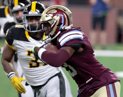 Michigan Panthers wide receiver Ishmael Hyman runs for extra yards as Pittsburgh Maulers defender Kyahva Tezino closes in to stop him during the game at Ford Field in Detroit on Saturday, May 13, 2023. The Maulers beat the Panthers, 23-7.