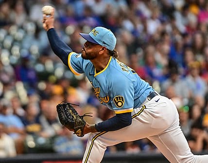 Aug 26, 2022; Milwaukee, Wisconsin, USA;  Milwaukee Brewers pitcher Freddy Peralta (51) throws a pitch in the first inning against the Chicago Cubs at American Family Field. Mandatory Credit: Benny Sieu-USA TODAY Sports