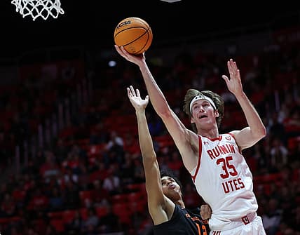 Jan 5, 2023; Salt Lake City, Utah, USA; Utah Utes center Branden Carlson (35) shoots the ball over Oregon State Beavers forward Michael Rataj (12) in the second half at Jon M. Huntsman Center. Mandatory Credit: Rob Gray-USA TODAY Sports