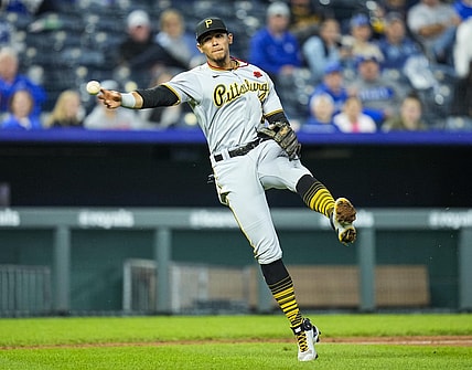 May 31, 2021; Kansas City, Missouri, USA; Pittsburgh Pirates third baseman Erik Gonzalez (2) throws to first base against the Kansas City Royals during the fifth inning at Kauffman Stadium. Mandatory Credit: Jay Biggerstaff-USA TODAY Sports