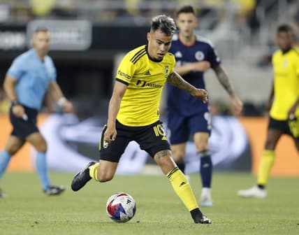 Apr 15, 2023; Columbus, Ohio, USA;  Columbus Crew midfielder Lucas Zelarayan (10) dribbles during the second half against the New England Revolution at Lower.com Field. Mandatory Credit: Joseph Maiorana-USA TODAY Sports