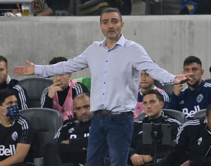 Nov 2, 2021; Los Angeles, California, USA;  Vancouver Whitecaps head coach Vanni Sartini yells from the sidelines in the first half at Banc of California Stadium. Mandatory Credit: Jayne Kamin-Oncea-USA TODAY Sports