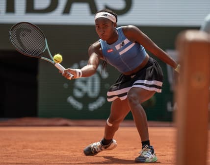 Jun 7 2023; Paris,France; Coco Gauff (USA) returns a shot during her match against Iga Swiatek (POL) on day 11 at Stade Roland-Garros. Mandatory Credit: Susan Mullane-USA TODAY Sports