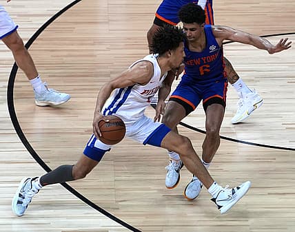 Aug 13, 2021; Las Vegas, Nevada, USA; Detroit Pistons guard Cade Cunningham (2) dribbles against New York Knicks guard Elfrid Payton (6) during an NBA Summer League game at Thomas & Mack Center. Mandatory Credit: Stephen R. Sylvanie-USA TODAY Sports