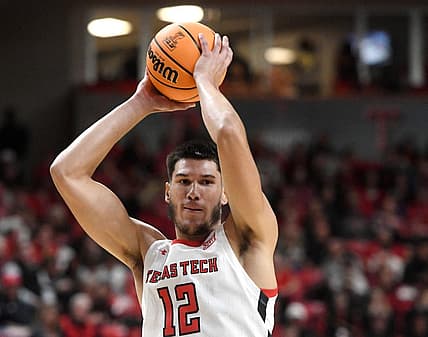 Texas Tech's forward Daniel Batcho (12) looks to pass the ball against Northwestern State in a basketball game, Monday, Nov. 7, 2022, at United Supermarkets Arena.