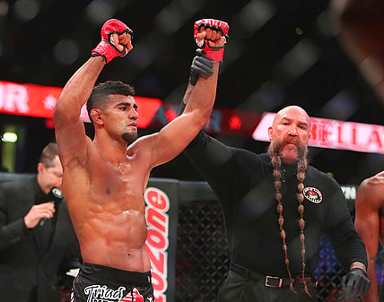 May 11, 2019; Rosemont, IL, USA;  Douglas Lima (red gloves) defeats Michael Page (blue gloves) during Bellator 221 at Allstate Arena. Mandatory Credit: Jerry Lai-USA TODAY Sports