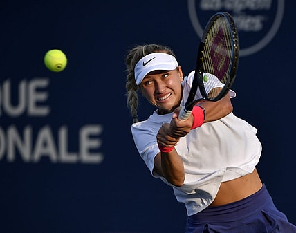 Aug 9, 2021; Montreal, Quebec, Canada; Anastasia Potapova of Russia hits a shot against Shelby Rogers of the United States (not pictured) during first round play at Stade IGA. Mandatory Credit: Eric Bolte-USA TODAY Sports