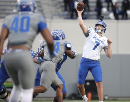 Memphis Tigers quarterback Grant Gunnell throws the ball during their Friday Night Stripes spring game at the Liberty Bowl Memorial Stadium on Friday, April 16, 2021.

A11i1727