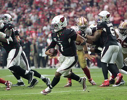 Oct 10, 2021; Glendale, Arizona, USA; Arizona Cardinals quarterback Kyler Murray (1) scrambles away from pressure against the San Francisco 49ers during the third quarter at State Farm Stadium. Mandatory Credit: Michael Chow-USA TODAY Sports