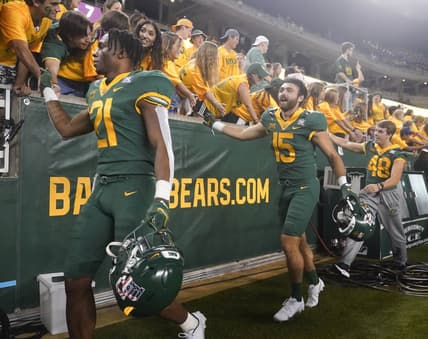 Sep 11, 2021; Waco, Texas, USA; Baylor Bears players greet fans along the sidelines after a victory over the Texas Southern Tigers at McLane Stadium. Mandatory Credit: Scott Wachter-USA TODAY Sports