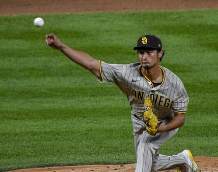 Sep 24, 2022; Denver, Colorado, USA; San Diego Padres starting pitcher Yu Darvish (11) delivers a pitch during the third inning against the Colorado Rockies at Coors Field. Mandatory Credit: John Leyba-USA TODAY Sports