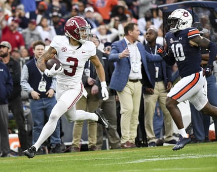 Nov 25, 2023; Auburn, Alabama, USA;  Alabama Crimson Tide wide receiver Jermaine Burton (3) runs against Auburn Tigers safety Zion Puckett (10) for a touchdown at Jordan-Hare Stadium. Mandatory Credit: Gary Cosby Jr.-USA TODAY Sports