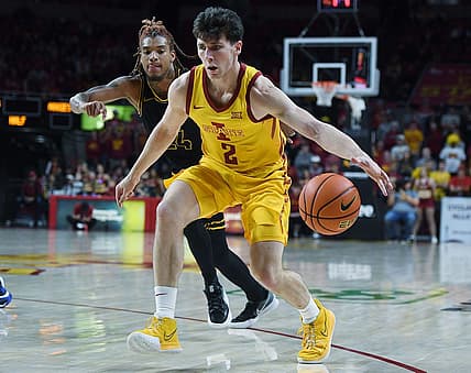 Iowa State University Cyclones guard Caleb Grill (2) drives past North Carolina A&T Aggies forward Webster Filmore (25)  during the first half at Hilton Coliseum Sunday, Nov. 13, 2022, in Ames, Iowa.  Photo by Nirmalendu Majumdar/Ames Tribune

Ncaa Men S Basketball