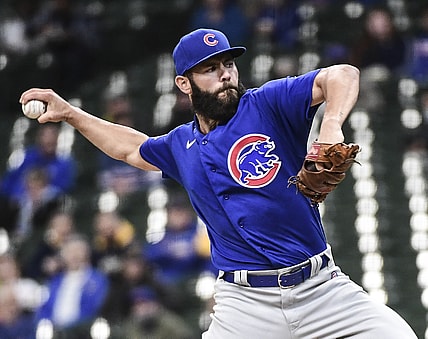 Apr 14, 2021; Milwaukee, Wisconsin, USA; Chicago Cubs pitcher Jake Arrieta (49) throws a pitch in the first inning against the Milwaukee Brewers at American Family Field. Mandatory Credit: Benny Sieu-USA TODAY Sports