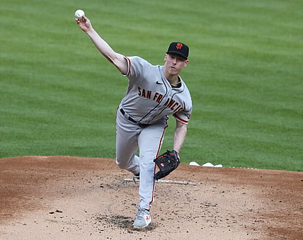 May 18, 2021; Cincinnati, Ohio, USA; San Francisco Giants starting pitcher Anthony DeSclafani (26) throws against the Cincinnati Reds during the first inning at Great American Ball Park. Mandatory Credit: David Kohl-USA TODAY Sports