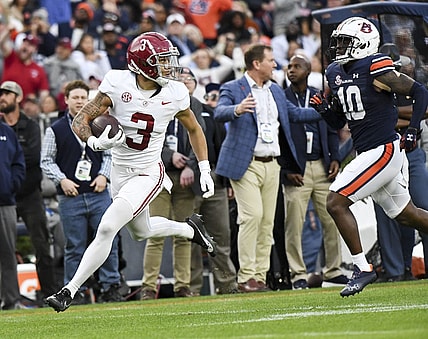 Nov 25, 2023; Auburn, Alabama, USA;  Alabama Crimson Tide wide receiver Jermaine Burton (3) runs against Auburn Tigers safety Zion Puckett (10) for a touchdown at Jordan-Hare Stadium. Mandatory Credit: Gary Cosby Jr.-USA TODAY Sports